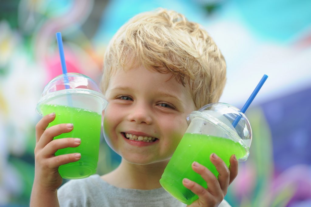 Alex Bayntun, 5, shows one way to keep cool in this hot humid weather but it requires two slushies from your parents Tropical Island slushie machine. Alex Bayntun, 5, shows one way to keep cool in this hot humid weather but it requires two slushies from your parents Tropical Island slushie machine.