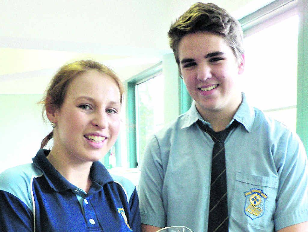 St Patrick’s College students Nicole Kratochvil and Andrew Davis are ready to serve. St Patrick’s College students Nicole Kratochvil and Andrew Davis are ready to serve.