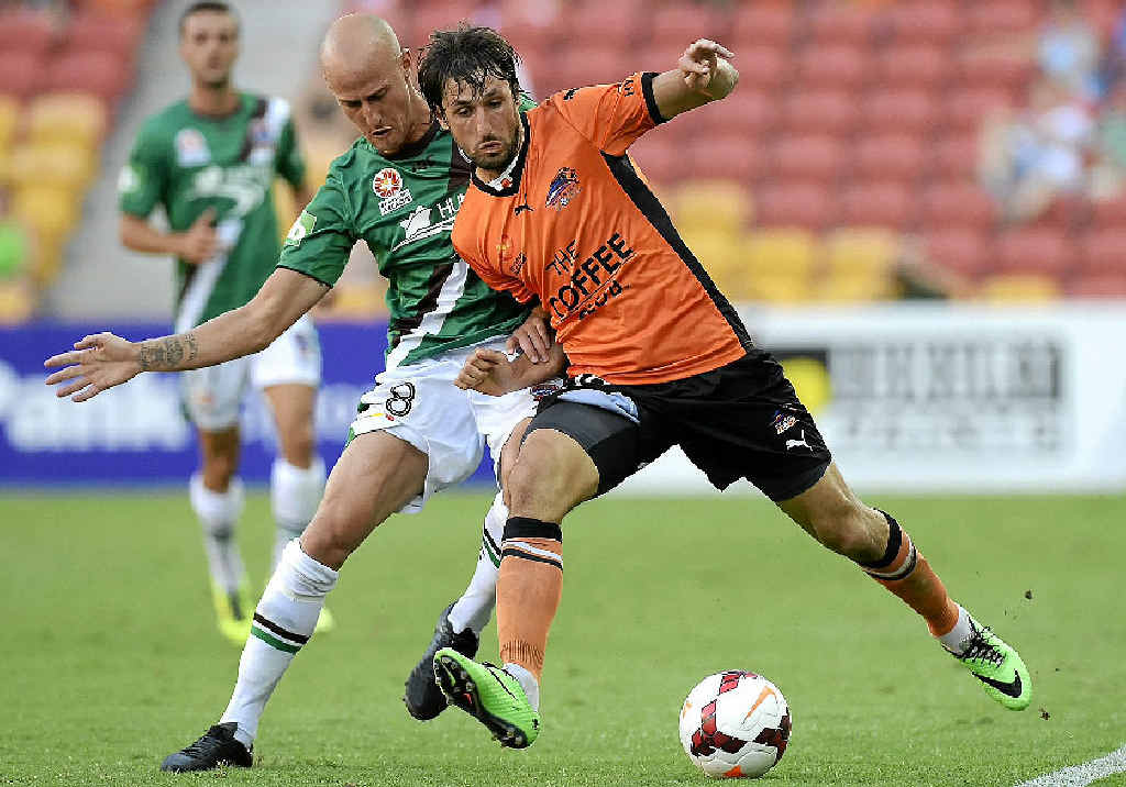 CLASH: Thomas Broich, of the Roar, and Ruben Zadkovich, of the Jets, challenge for the ball at Suncorp Stadium yesterday. CLASH: Thomas Broich, of the Roar, and Ruben Zadkovich, of the Jets, challenge for the ball at Suncorp Stadium yesterday.