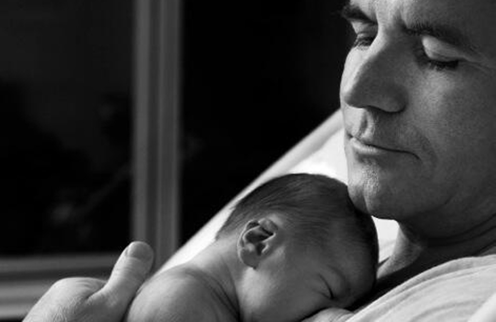 X Factor boss Simon Cowell with baby Eric X Factor boss Simon Cowell with baby Eric
