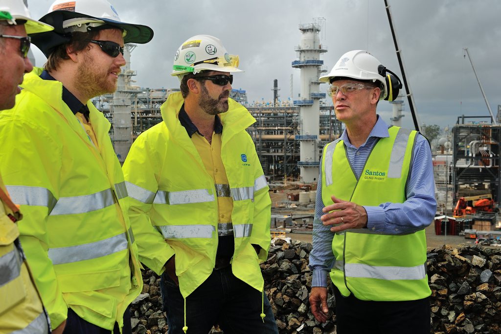 Premier Campbell Newman visited the Santos GLNG site, here talking with workers Shannon Nankivell (left) and Adam Barber. Premier Campbell Newman visited the Santos GLNG site, here talking with workers Shannon Nankivell (left) and Adam Barber.