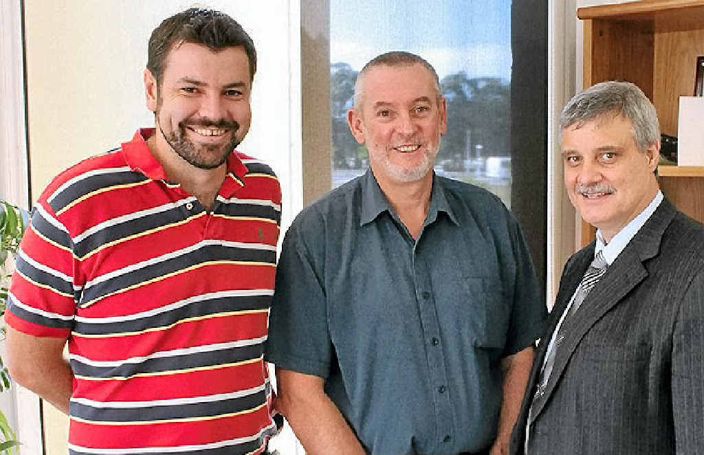HELP ARRIVES: Prof De Marco, right, welcomes Dr Polkinghorne, left, and Prof Timms. HELP ARRIVES: Prof De Marco, right, welcomes Dr Polkinghorne, left, and Prof Timms.