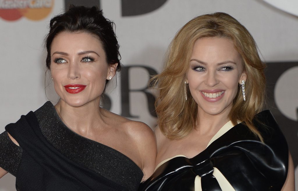 Sisters Dannii and Kylie Minogue arrive on the red carpet. Sisters Dannii and Kylie Minogue arrive on the red carpet.
