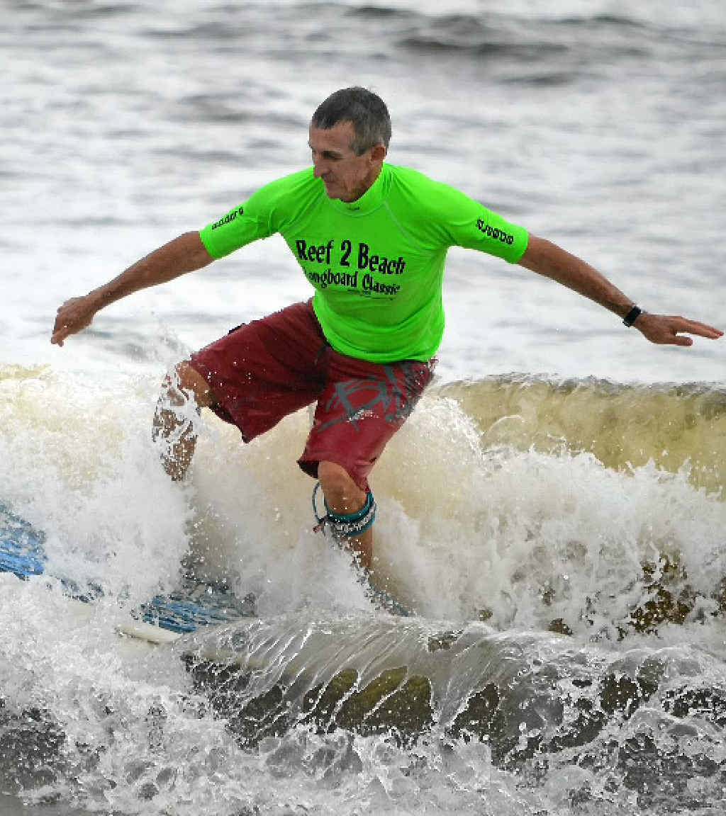 Tannum Sands' Peter Farlow finishes a good wave with a close-out re-entry in the Reef2Beach Longboard Classic. Tannum Sands' Peter Farlow finishes a good wave with a close-out re-entry in the Reef2Beach Longboard Classic.