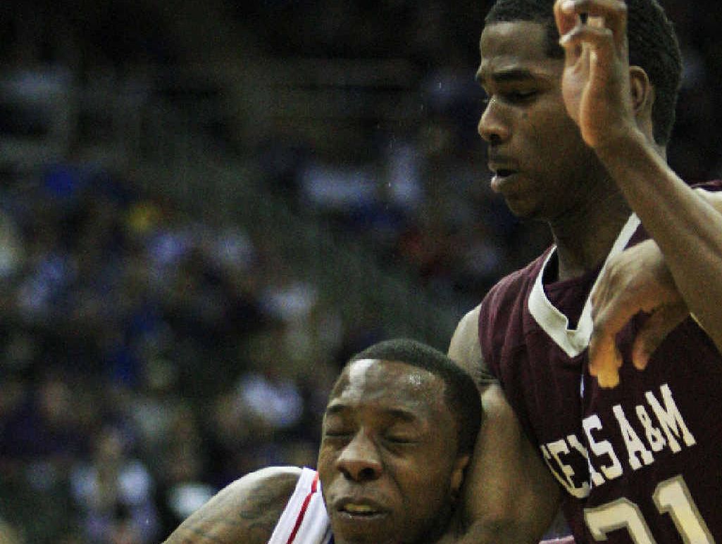 IN ACTION: New Rockets recruit Ray Turner (right) playing for the University of Texas. IN ACTION: New Rockets recruit Ray Turner (right) playing for the University of Texas.