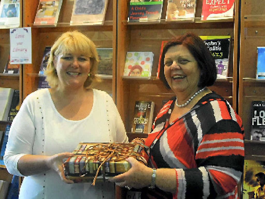 PRIZE PAD: Enrolling in a free online guide to using web technologies paid dividends for Annette Smolej, who was awarded an iPad by Mayor Gail Sellers.