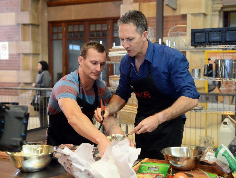 Blair and Paul cooking at Sydney's Central Station.