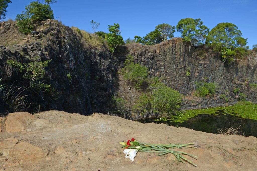 LONELY TRIBUTE: Flowers left at The Island Quarry in Byron Bay, where a Victorian man drowned on Sunday. LONELY TRIBUTE: Flowers left at The Island Quarry in Byron Bay, where a Victorian man drowned on Sunday.