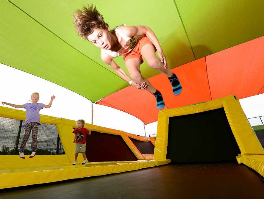 FLYING HIGH: Jayden Lippi, 11, celebrates his birthday with some jumps at the trampoline park while Edie Roslin-Clark and Stanley Roslin-Clark watch on. FLYING HIGH: Jayden Lippi, 11, celebrates his birthday with some jumps at the trampoline park while Edie Roslin-Clark and Stanley Roslin-Clark watch on.