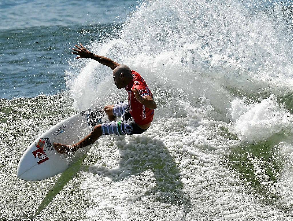 HE’S BACK: Kelly Slater, shredding Snapper last year, will defend his Quicksilver Pro title on the Gold Coast. HE’S BACK: Kelly Slater, shredding Snapper last year, will defend his Quicksilver Pro title on the Gold Coast.