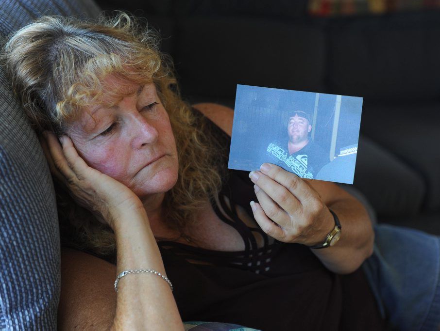 Denise Brooks with a picture of her son Grant Brooks who died from testicular cancer. 