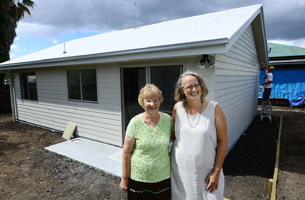 NEW VALUE: Real estate agent Sonia Woolley (right) and Cath Hannard outside her newly built back garden home. NEW VALUE: Real estate agent Sonia Woolley (right) and Cath Hannard outside her newly built back garden home.