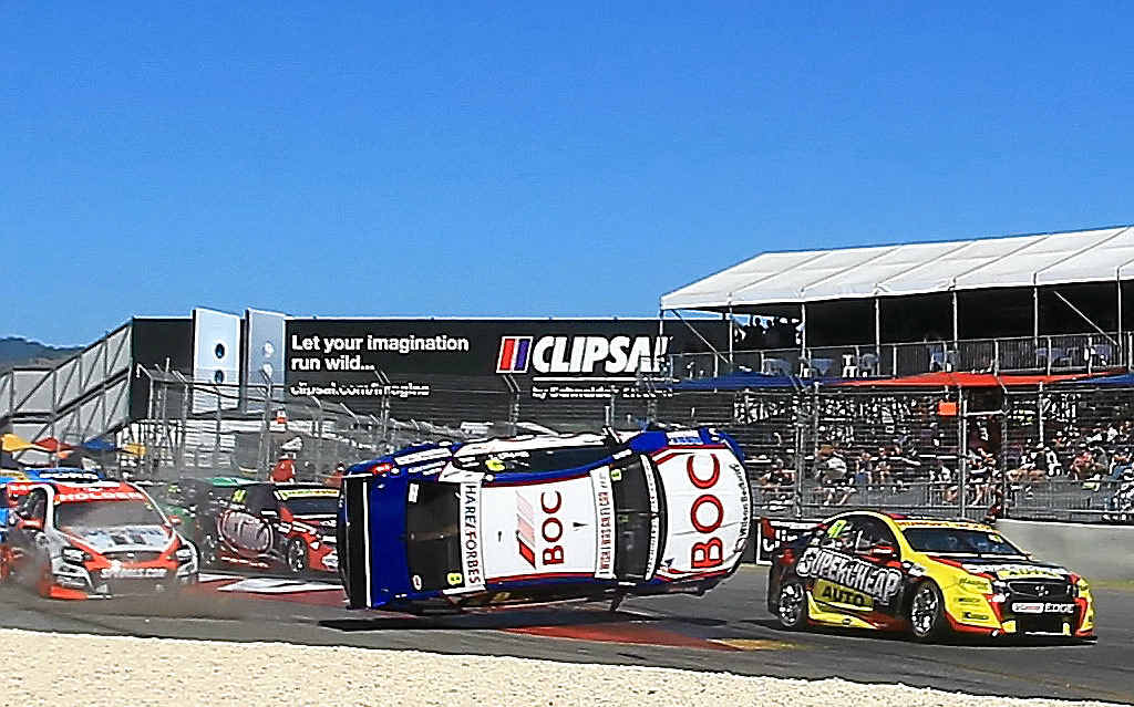 BIG MOMENT: Jason Bright’s Holden flies in the air after crashing in Adelaide yesterday. BIG MOMENT: Jason Bright’s Holden flies in the air after crashing in Adelaide yesterday.