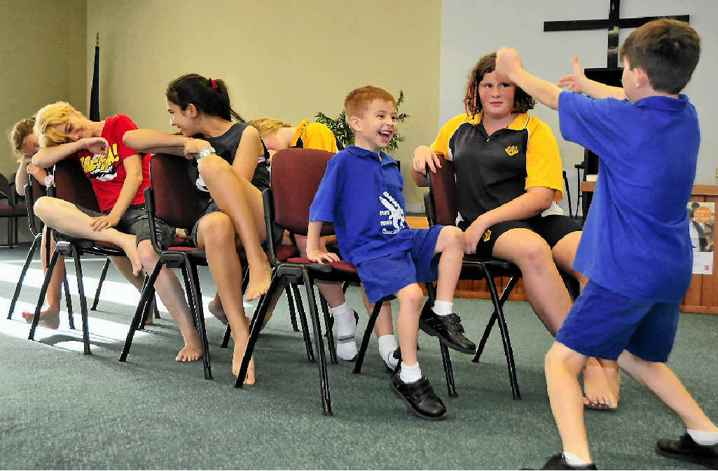 JOIN UP: Members of the Gladstone Performing Arts Company with Sarah Bobart. JOIN UP: Members of the Gladstone Performing Arts Company with Sarah Bobart.