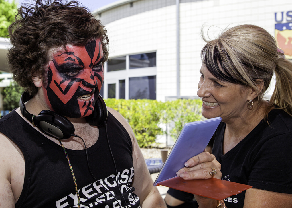 Matthew Hartvigsen takes a look in a mirror after having his face painted by Leanne Hodges from Fantasea Faces at last year's USQ Phoenix Carnival. Matthew Hartvigsen takes a look in a mirror after having his face painted by Leanne Hodges from Fantasea Faces at last year's USQ Phoenix Carnival.