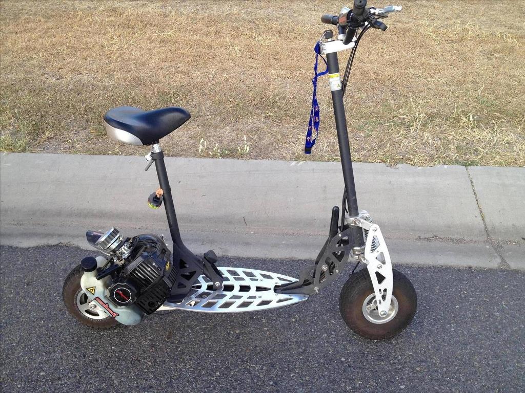 These petrol-powered scooters are illegal in Queensland unless they meet design standards and are registered as motorbikes. These petrol-powered scooters are illegal in Queensland unless they meet design standards and are registered as motorbikes.