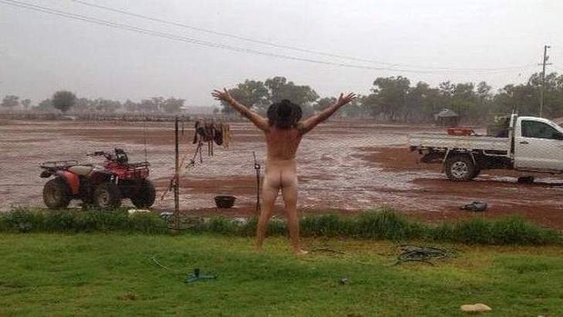 Cobar farmer James Rogers celebrating the arrival of rain. Photo: Jody Fraser
Cobar farmer James Rogers celebrating the arrival of rain. Photo: Jody Fraser