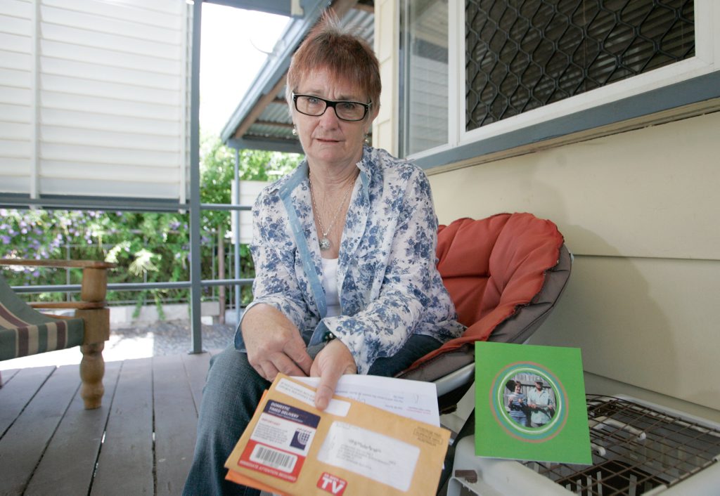 Lorraine Bunton is upset that she continues to get unsolicited mail addressed to her husband who died three years ago. Photo: Chris Ison / The Morning Bulletin Lorraine Bunton is upset that she continues to get unsolicited mail addressed to her husband who died three years ago. Photo: Chris Ison / The Morning Bulletin