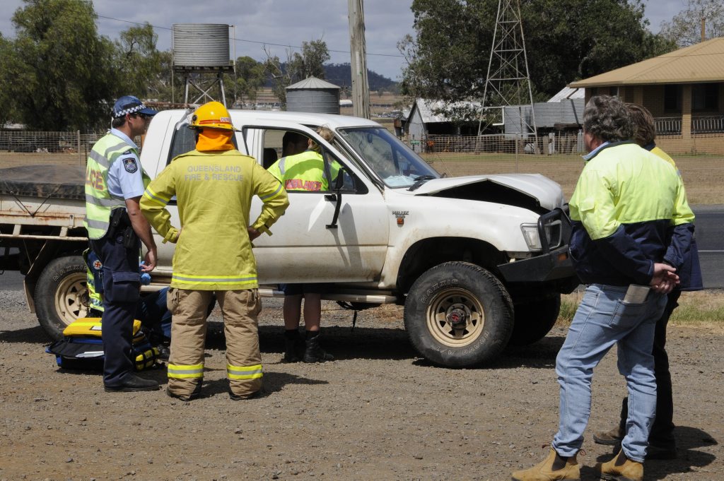 Emergency services at the scene of a two-vehicle crash on the Warrego Hwy. Emergency services at the scene of a two-vehicle crash on the Warrego Hwy.