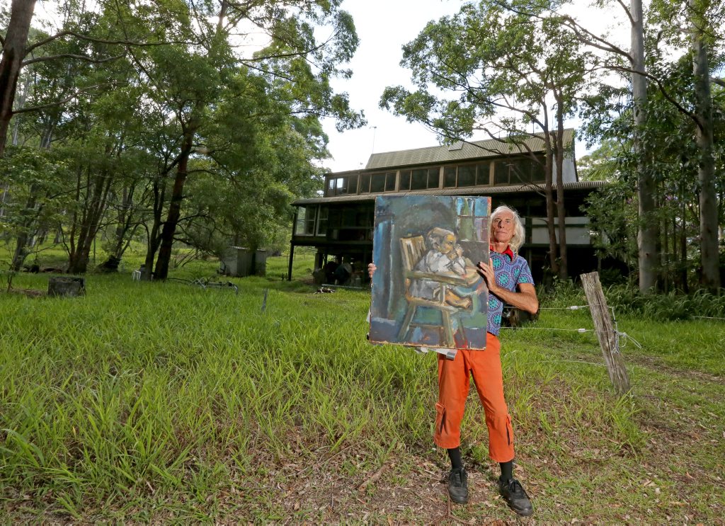 John Opit with the recovered painting, said to be worth $50 million. John Opit with the recovered painting, said to be worth $50 million.