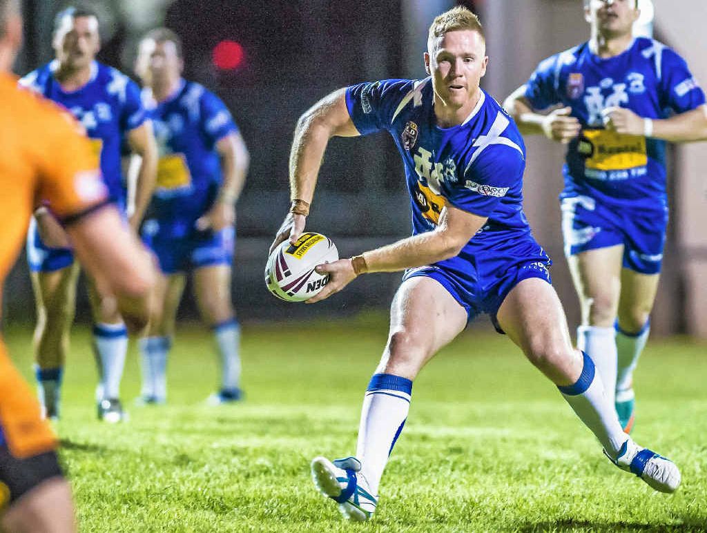 Josh Essex prepares to pass the ball against Wallabys at Marley Brown Oval in the first round of competition. Josh Essex prepares to pass the ball against Wallabys at Marley Brown Oval in the first round of competition.