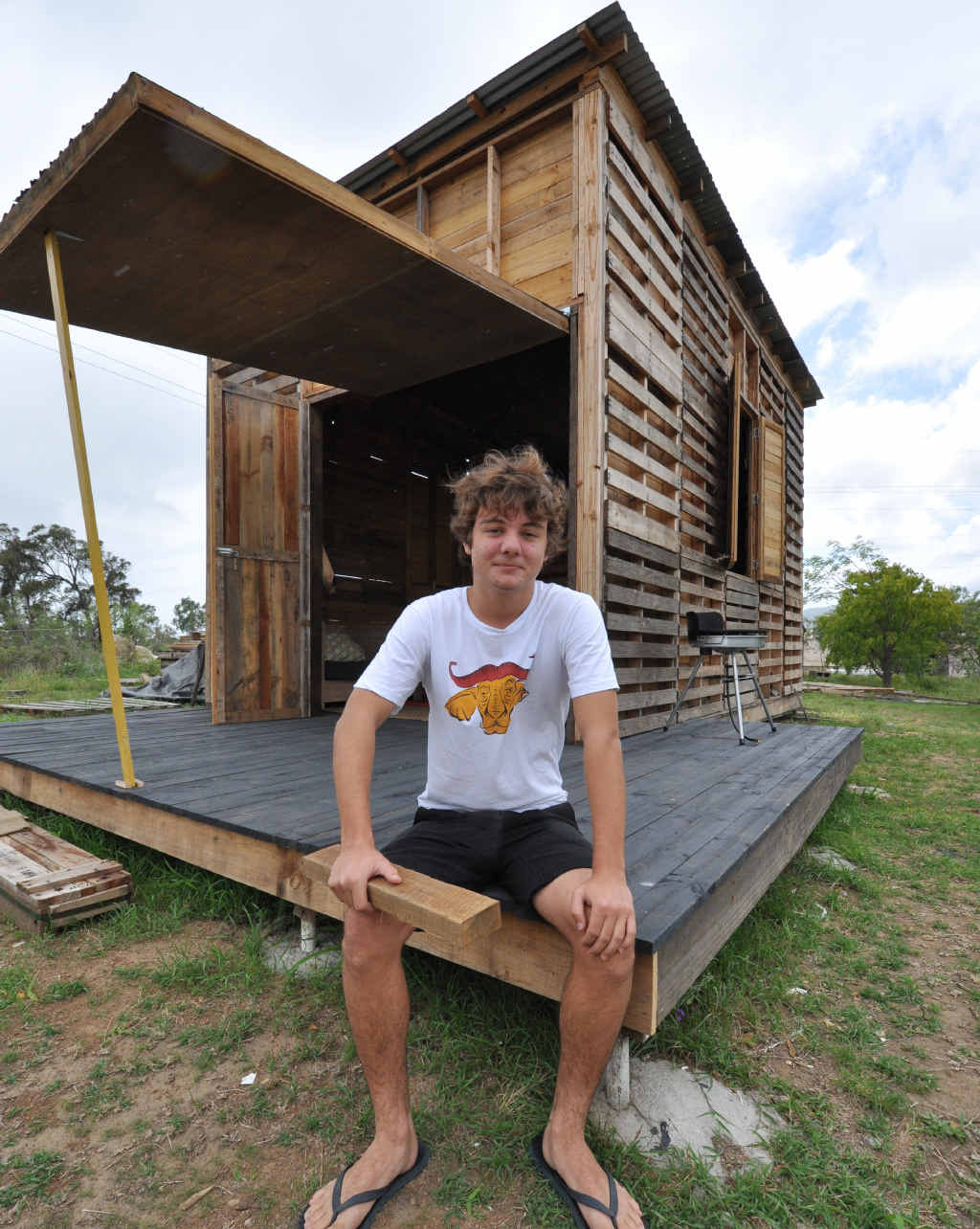 CASTAWAY CORNER: Angus Hughes has built his own student pad entirely from left-over pallets and packing timber. CASTAWAY CORNER: Angus Hughes has built his own student pad entirely from left-over pallets and packing timber.