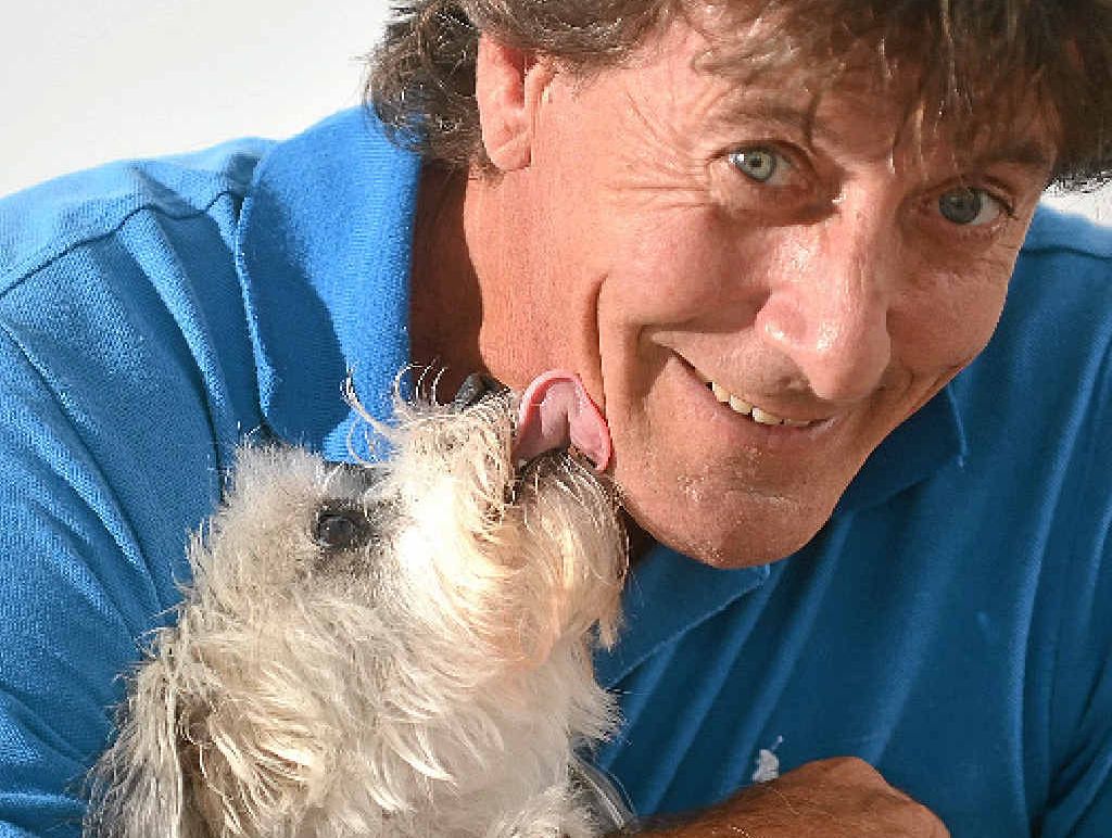 PROUD OWNER: Buderim resident Mike Hughes says he will be forever grateful to his puppy, Toby. PROUD OWNER: Buderim resident Mike Hughes says he will be forever grateful to his puppy, Toby.