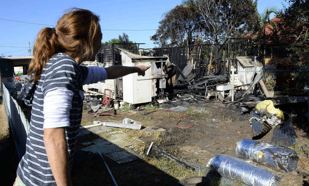 NOTHING LEFT: A neighbour checks out the aftermath the house fire. The house is disintegrated and there’s basically nothing left a neighbour told the Queensland Times. The fire is being investigated. NOTHING LEFT: A neighbour checks out the aftermath the house fire. The house is disintegrated and there’s basically nothing left a neighbour told the Queensland Times. The fire is being investigated.