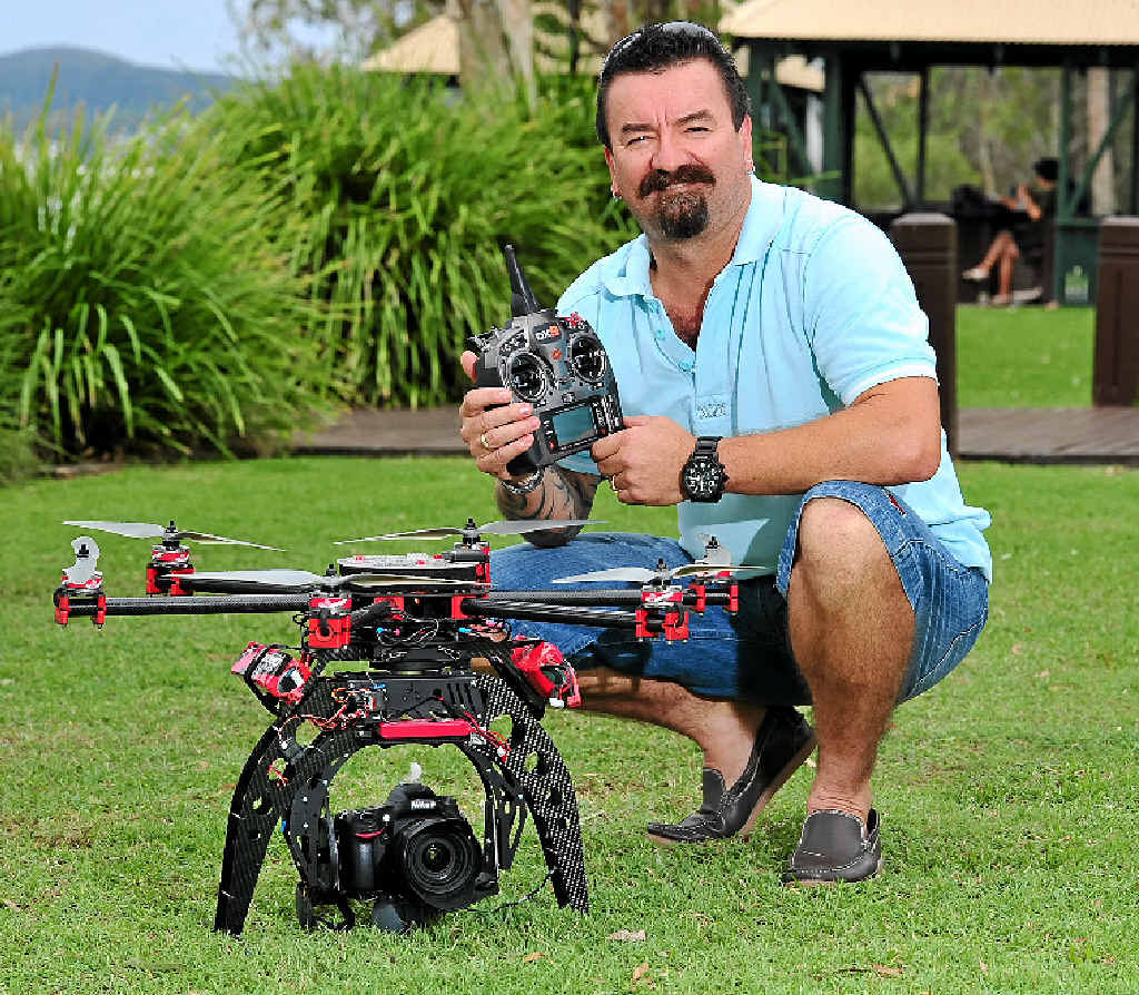 SKY’S THE LIMIT: Noosaville photographer Michael Garnham with his drone he will use for aerial work. SKY’S THE LIMIT: Noosaville photographer Michael Garnham with his drone he will use for aerial work.