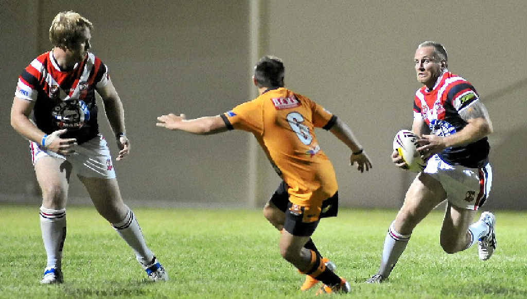 Luke Dyer looks for a hole in the Wallabys defence. Luke Dyer looks for a hole in the Wallabys defence.
