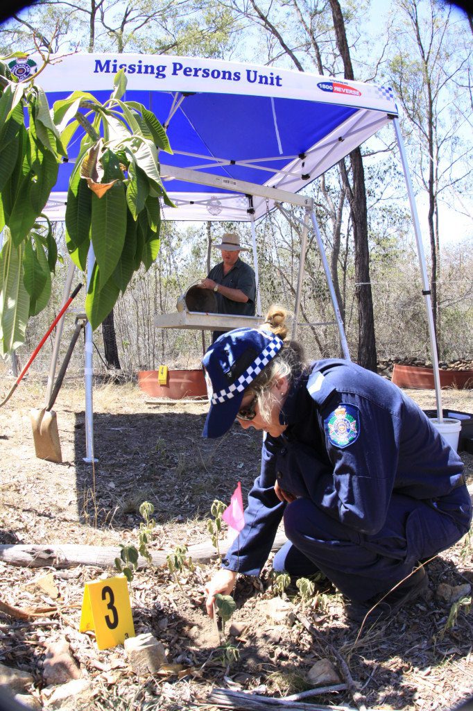 Police officers excavate a Gin Gin property for the remains of a number of babies believed to have been concealed on the land more than a decade ago. Photo Contributed Police officers excavate a Gin Gin property for the remains of a number of babies believed to have been concealed on the land more than a decade ago. Photo Contributed
