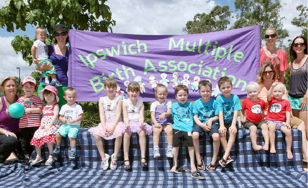 FUN OVERLOAD: Ipswich Multiple Birth Association members fly the flag at Robelle Domain Parklands, Springfield.