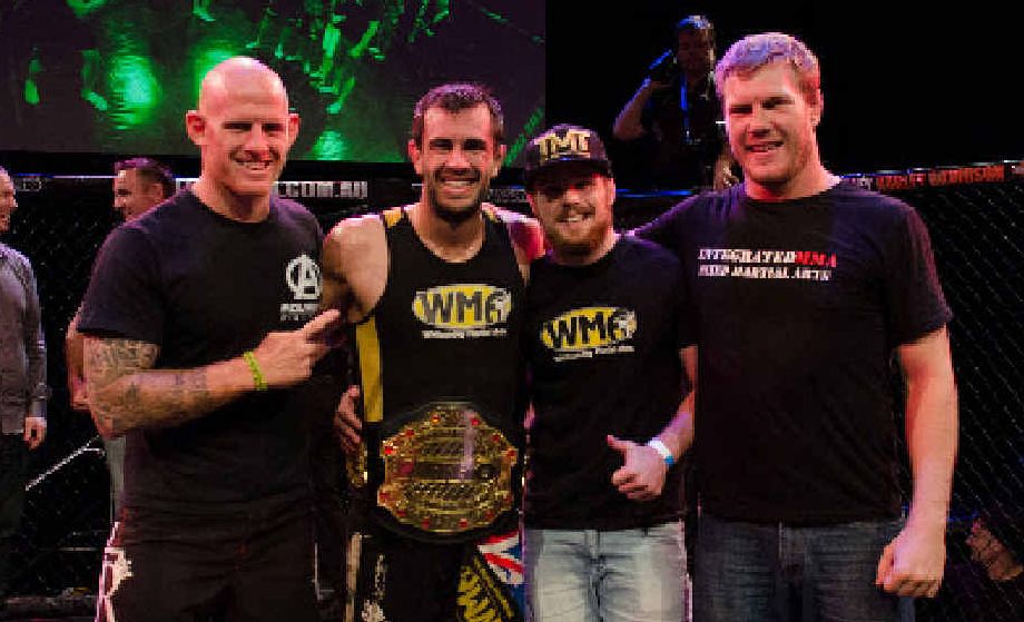 MMA KING: Anton Zafir (second left) after he won the Nitro Welterweight Title in Brisbane with his coaches and training partners Ian Bone, Dan Zealand and Rob Guiffrida. Photo by Huynh Nguyen MMA KING: Anton Zafir (second left) after he won the Nitro Welterweight Title in Brisbane with his coaches and training partners Ian Bone, Dan Zealand and Rob Guiffrida. Photo by Huynh Nguyen