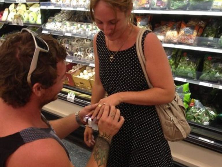 Warana's Clayton Byrne got down on one knee and proposed to his girlfriend Amy Gotz in the fruit and vegetable section of Woolworths. Warana's Clayton Byrne got down on one knee and proposed to his girlfriend Amy Gotz in the fruit and vegetable section of Woolworths.