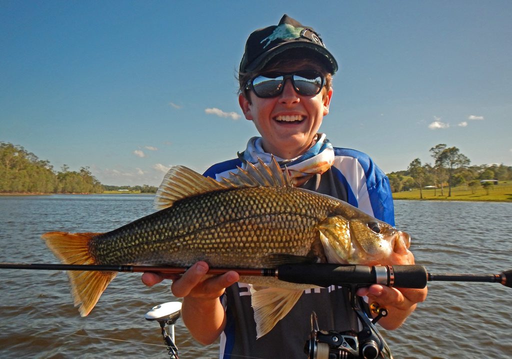 Mitchell Fredericks from Davo's Compleat Angler caught and released this 42cm bass at Lake MacDonald. Photo: Contributed Mitchell Fredericks from Davo's Compleat Angler caught and released this 42cm bass at Lake MacDonald. Photo: Contributed