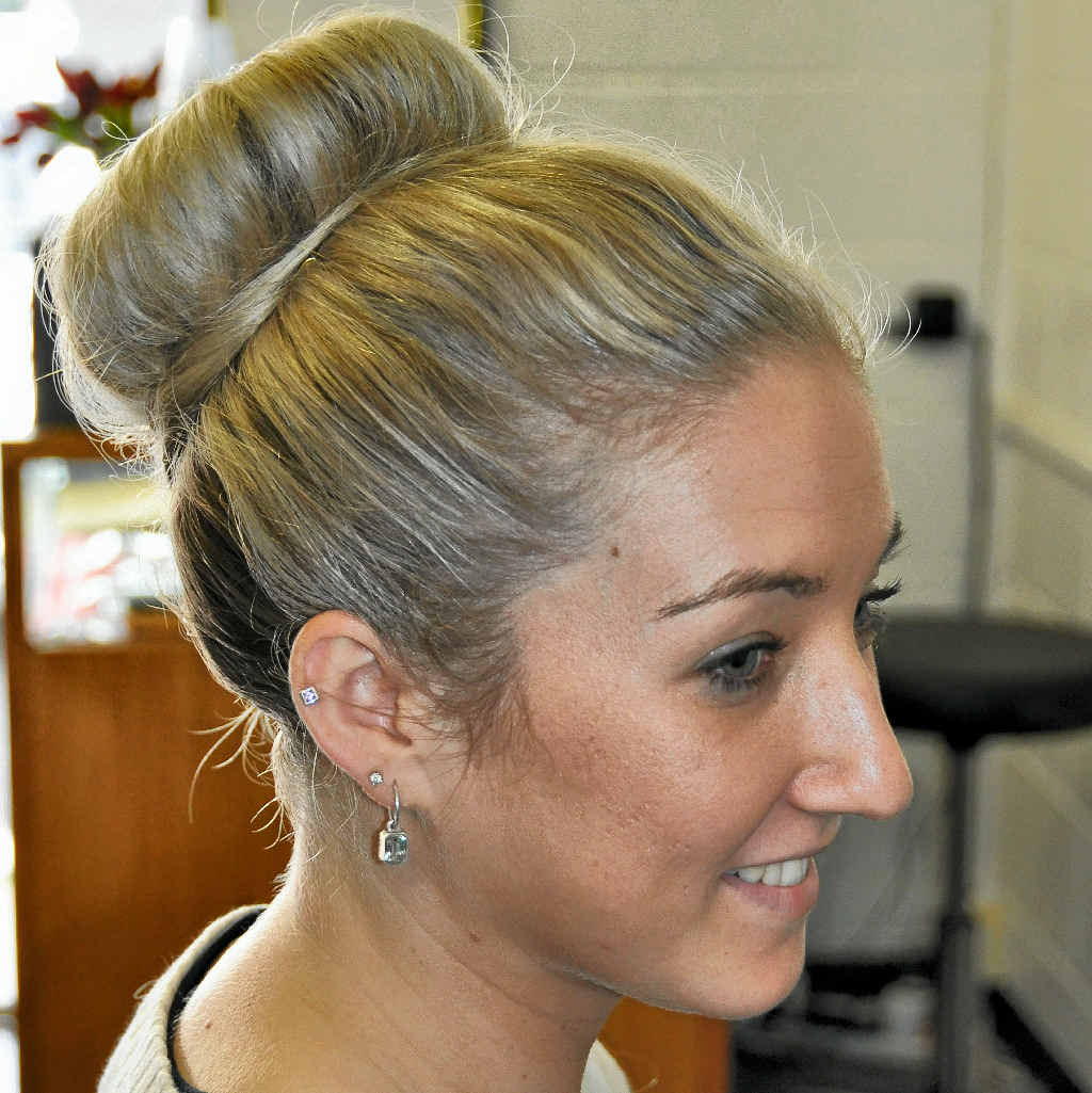 Step 4. Finish off with a touch of hair spray. This style can be worn casually or dressed up with a braid. Step 4. Finish off with a touch of hair spray. This style can be worn casually or dressed up with a braid.