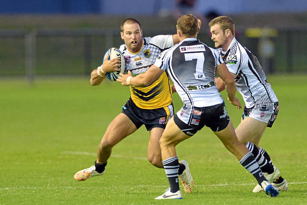 OUTGUNNED: Sunshine Coast Falcon Callum Klein is confronted by the Magpies defence at Stockland Park. OUTGUNNED: Sunshine Coast Falcon Callum Klein is confronted by the Magpies defence at Stockland Park.