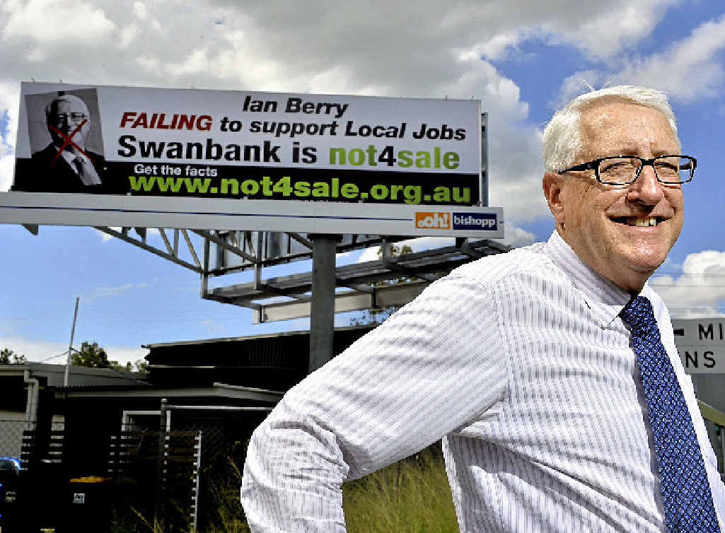 PHILOSOPHICAL: Ipswich Member Ian Berry in front of the billboard at the intersection of Mining Street and Brisbane Road. PHILOSOPHICAL: Ipswich Member Ian Berry in front of the billboard at the intersection of Mining Street and Brisbane Road.