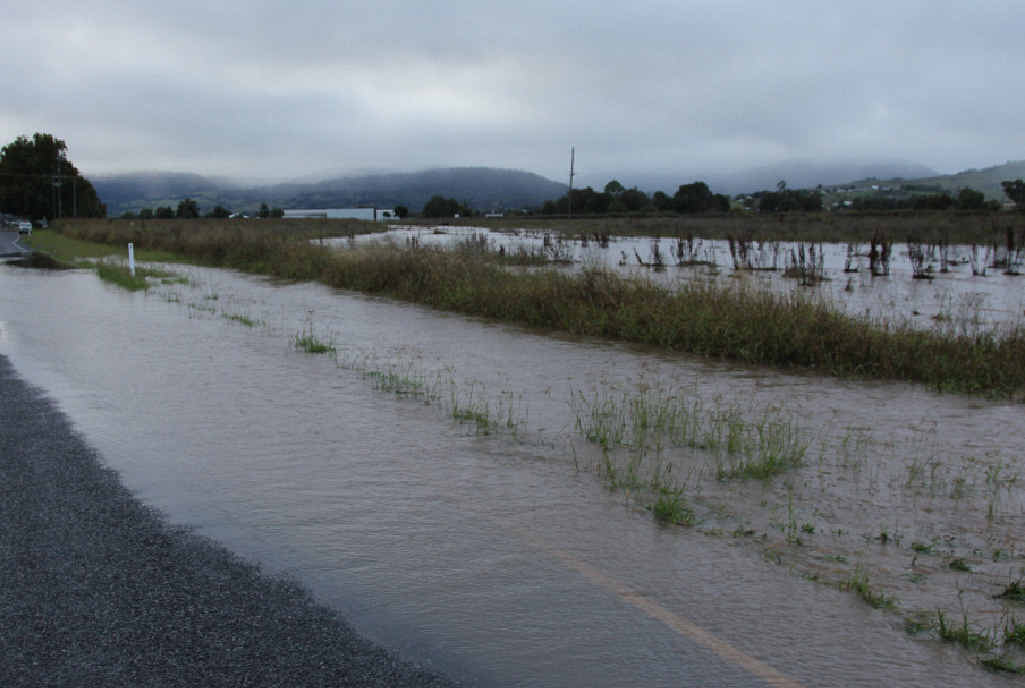 DOWNPOUR: Water over the road at Killarney. DOWNPOUR: Water over the road at Killarney.