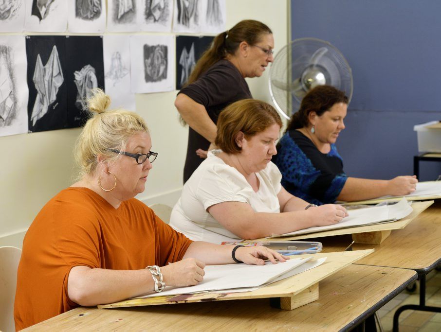 Life drawing students at Arts Alive draw the male form during an evening class. Photo: Claudia Baxter / The Queensland Times