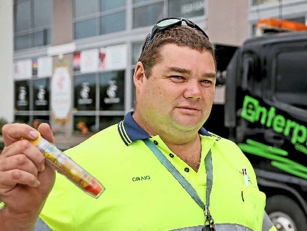 CLOSE CALL: Tweed tow truck driver Craig Mitchelson, pictured with an EpiPen, was minutes away from death after getting stung by wasps. CLOSE CALL: Tweed tow truck driver Craig Mitchelson, pictured with an EpiPen, was minutes away from death after getting stung by wasps.