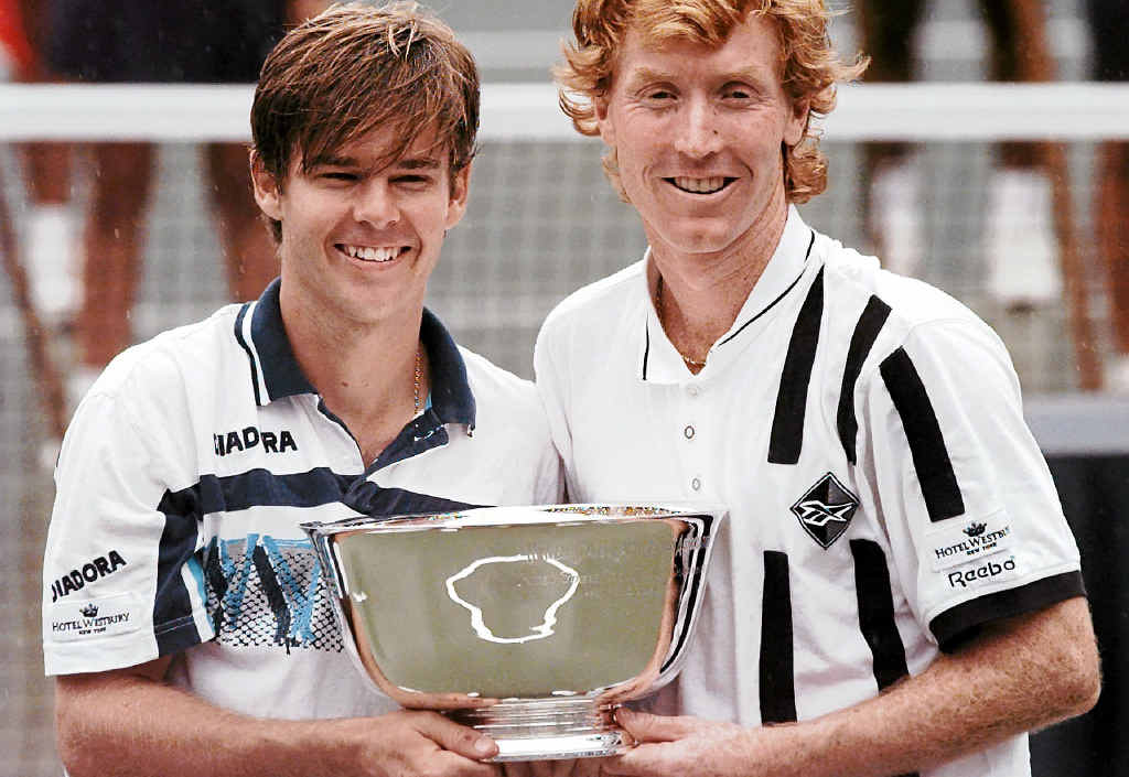 WINNING TEAM: Todd Woodbridge, left, and Mark Woodforde, posing with their trophy after winning the men’s doubles final match at the US Open tennis tournament in New York in 1996. WINNING TEAM: Todd Woodbridge, left, and Mark Woodforde, posing with their trophy after winning the men’s doubles final match at the US Open tennis tournament in New York in 1996.