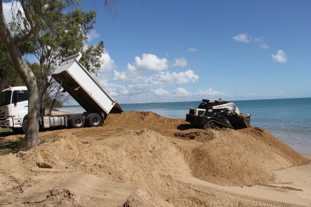 Sand from a stockpile near the Seafront Oval is used to replenish dunes west of the Margaret St groyne in Urangan. Sand from a stockpile near the Seafront Oval is used to replenish dunes west of the Margaret St groyne in Urangan.
