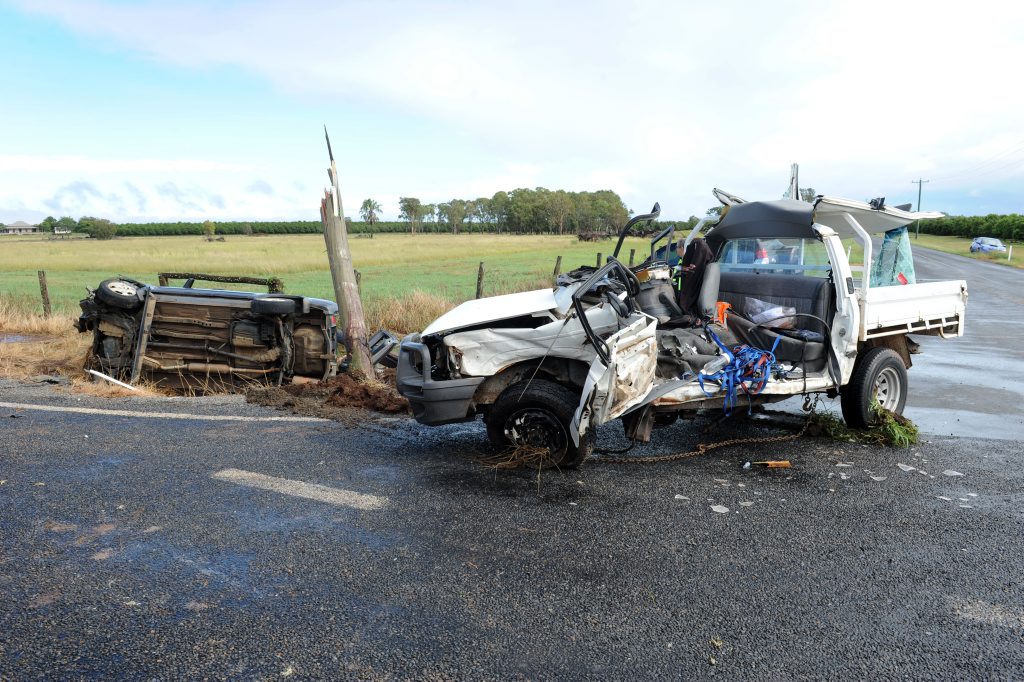 DRIVE TO THE CONDITIONS: The scene of the car crash at the intersection of Hummock Road and Elliott Heads Road. Photo: Mike Knott / NewsMail DRIVE TO THE CONDITIONS: The scene of the car crash at the intersection of Hummock Road and Elliott Heads Road. Photo: Mike Knott / NewsMail