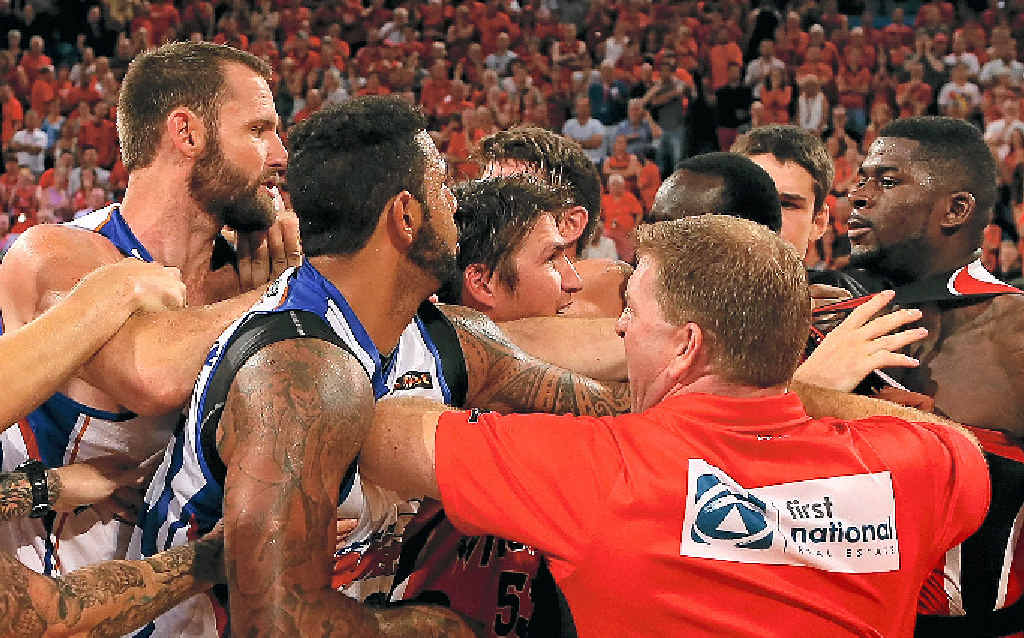 ON COURT BLOW-UP: Wildcats coach Trevor Gleeson and Damian Martin (centre) attempt to separate James Ennis (right) and Anthony Petrie and BJ Anthony of the 36ers as players and coaches from both sides become involved in a melee when the sides met in February. ON COURT BLOW-UP: Wildcats coach Trevor Gleeson and Damian Martin (centre) attempt to separate James Ennis (right) and Anthony Petrie and BJ Anthony of the 36ers as players and coaches from both sides become involved in a melee when the sides met in February.