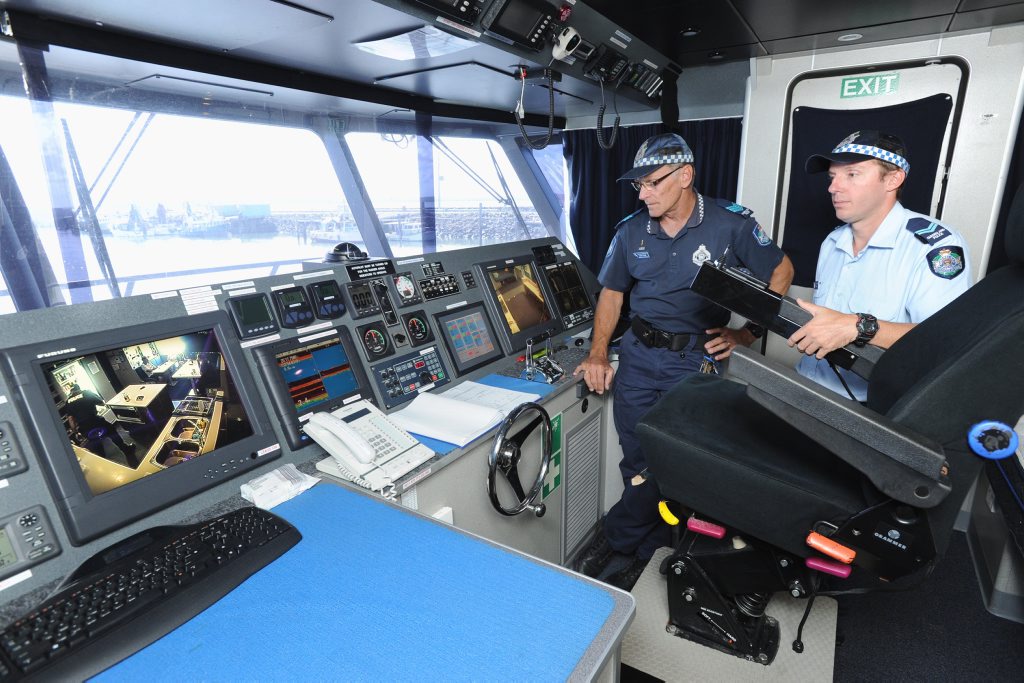 Acting Sergeant Marty Webb and Senior Constable Shannon Gray on Police vessel Lyle M Hoey in Urangan Marina. Acting Sergeant Marty Webb and Senior Constable Shannon Gray on Police vessel Lyle M Hoey in Urangan Marina.