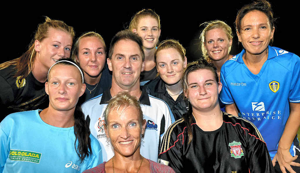 KICKING GOALS: Maroochydore Women’s Soccer coach Andrew Thrift with some of his team. KICKING GOALS: Maroochydore Women’s Soccer coach Andrew Thrift with some of his team.