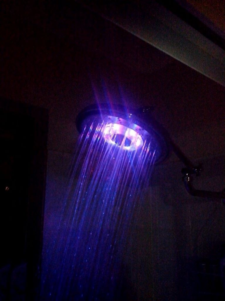 A shower head that glows blue when the temperature of the water is cold A shower head that glows blue when the temperature of the water is cold