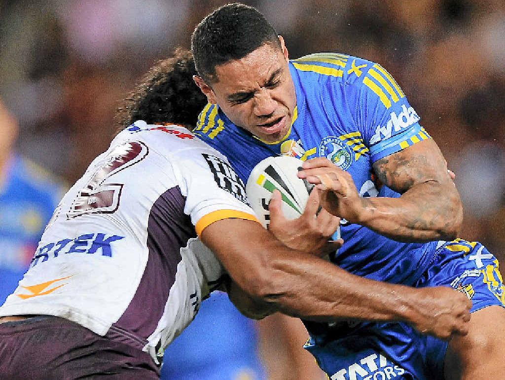 CRUNCH TIME: Willie Tonga of the Eels is tackled by a Brisbane Broncos player at Suncorp Stadium last night. CRUNCH TIME: Willie Tonga of the Eels is tackled by a Brisbane Broncos player at Suncorp Stadium last night.