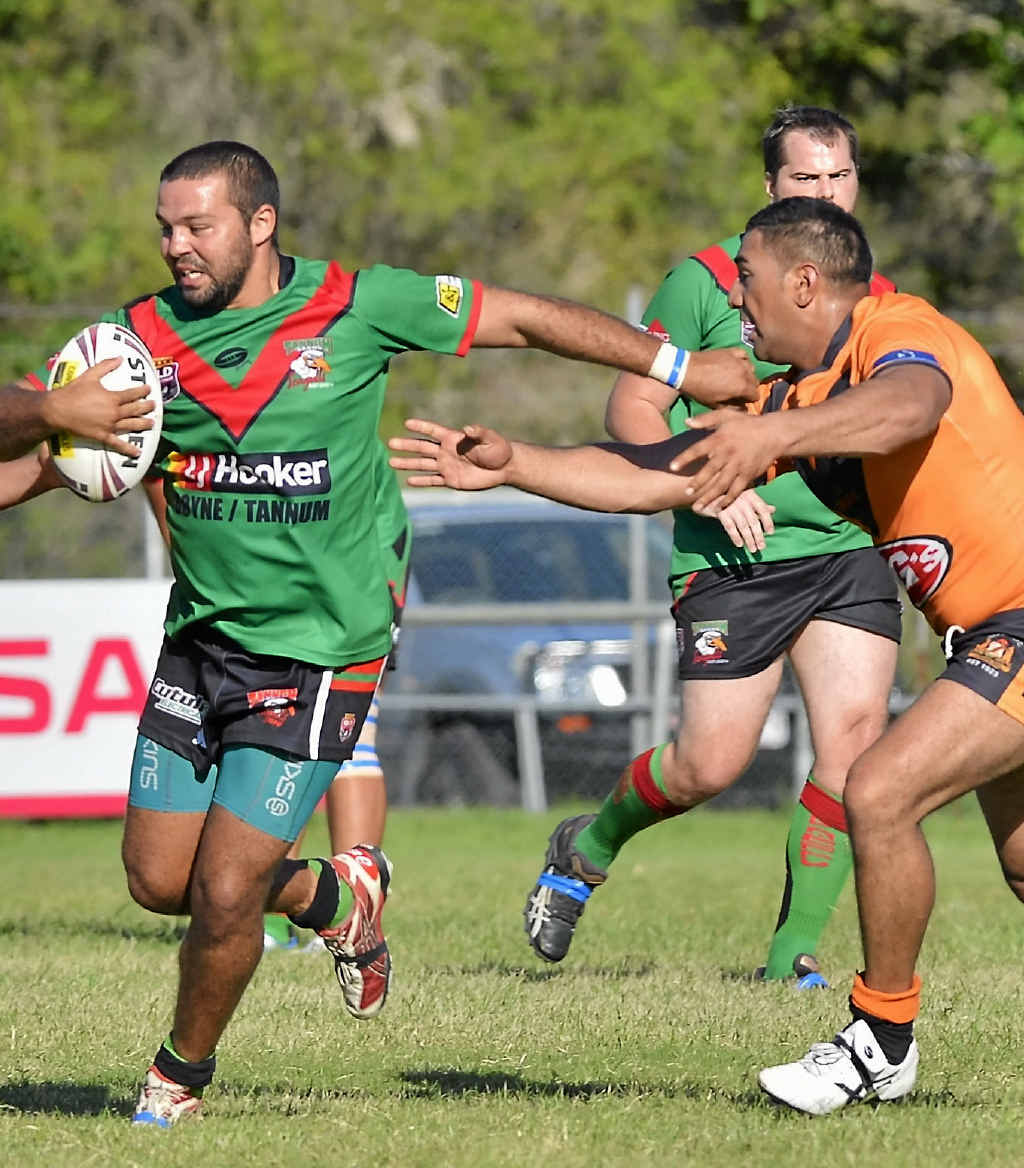 Will O’Brien breaks through the tackle from a couple of tiring Wallabys defenders. A five year player with Tannum Sands, O’Brien is stepping up as a leader. Will O’Brien breaks through the tackle from a couple of tiring Wallabys defenders. A five year player with Tannum Sands, O’Brien is stepping up as a leader.